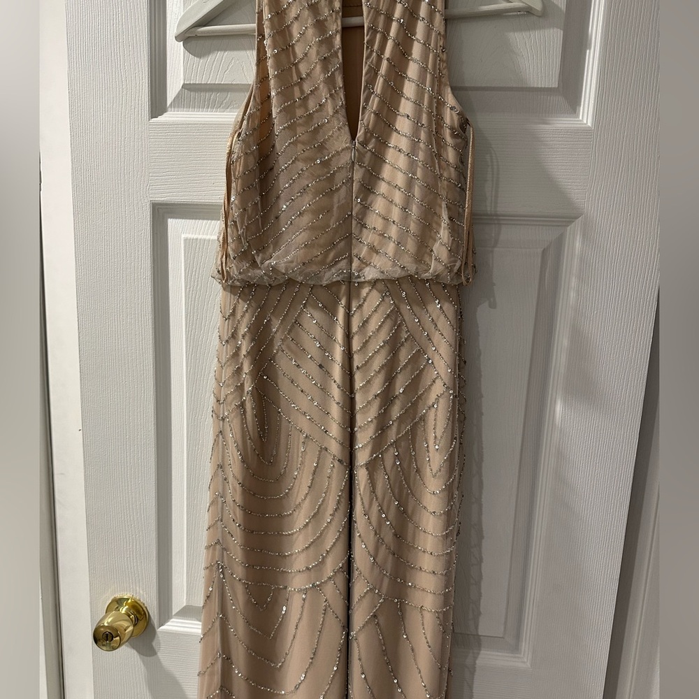 It worn just 1 time for my friends wedding and dry cleaning. Is seems like new